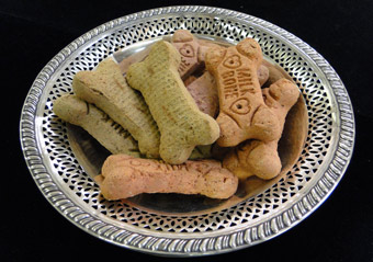 Silver serving bowl with dog treats